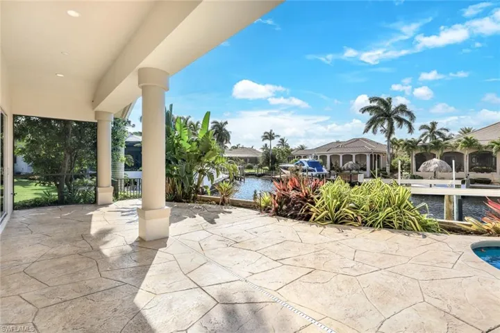 View of patio with a water view