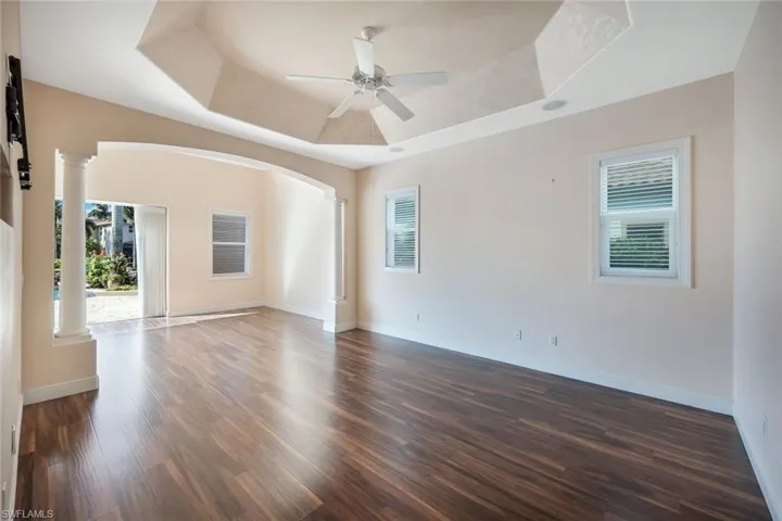 Oversized master bedroom, sitting area & access to pool/patio