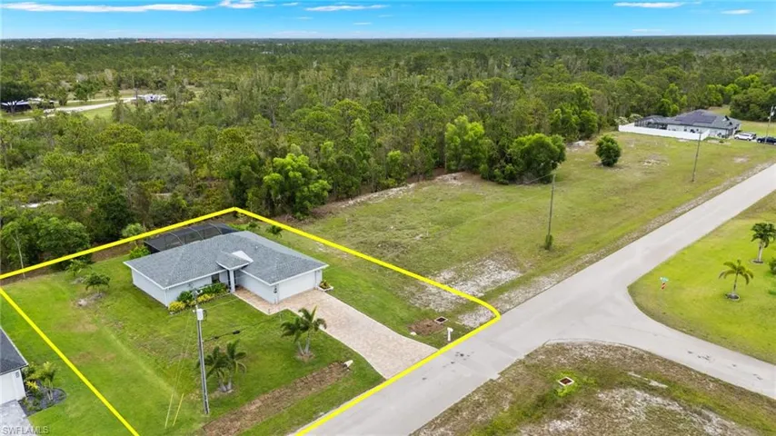 The lot directly to the East of the property is owned by the city of Cape Coral and won't ever be built on offering some extra privacy that you wouldn't normally get.