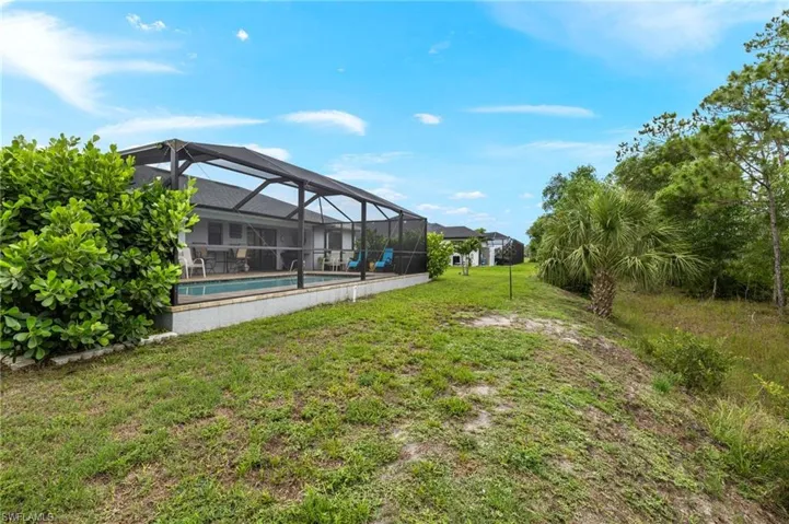Large back yard is larger than a standard cape coral lot with an extra 30' of depth.