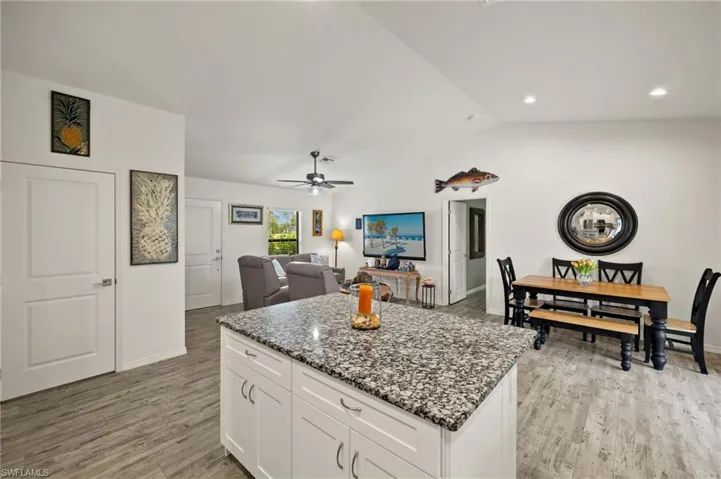 Kitchen is open to the living room and dining area allowing occupants to carry on conversations throughout the interior of the home.