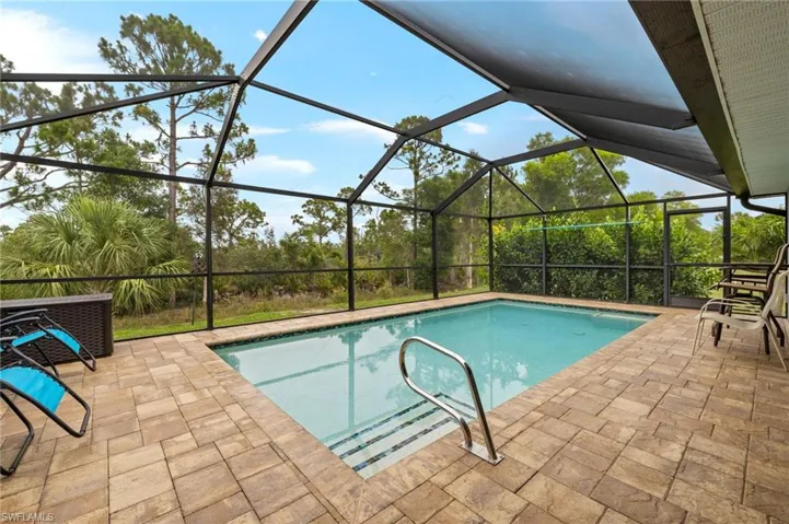 Beautiful private pool area has large pool deck with plenty of room for lounge chairs.