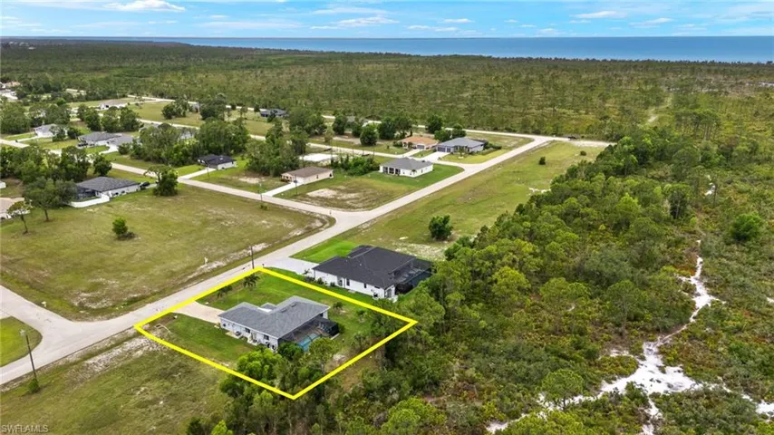Large wooded property behind the homes offers lots of privacy.