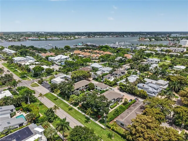Aerial perspective showcasing a residential landscape with prominent waterways
