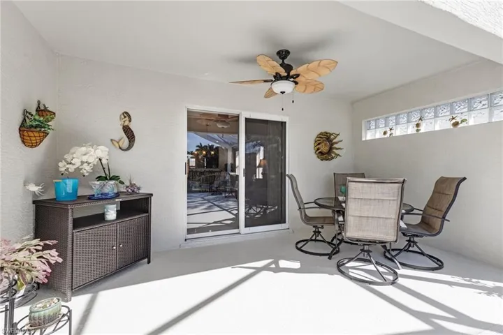 under cover area of lanai with ceiling fan