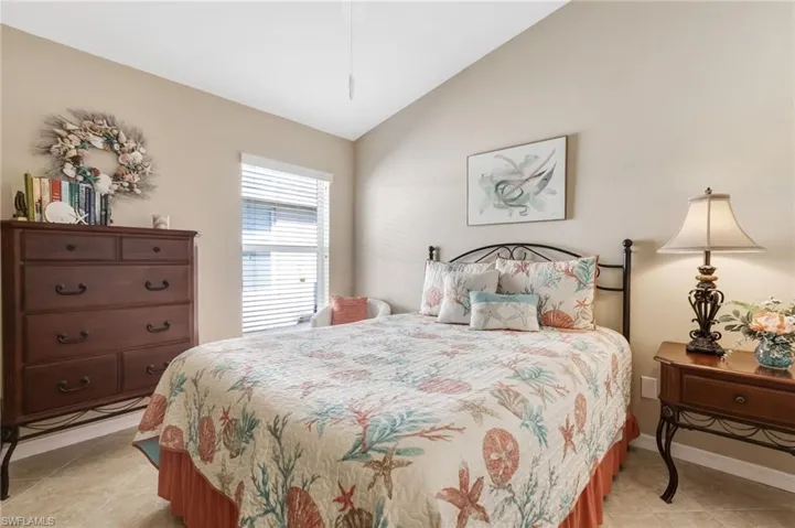 Bedroom with vaulted ceiling