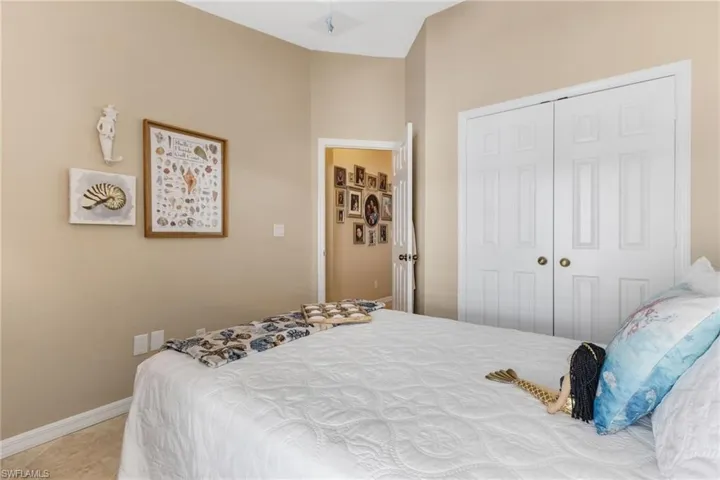 Bedroom with a closet and baseboards
