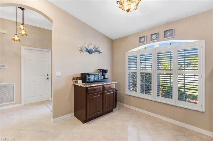 built-in coffee bar, plantation shutters on front window