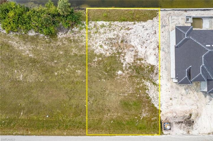 Gulf Access LotWith NEW 2023 seawall1212 NW 32nd Pl