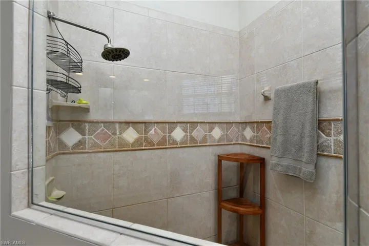 Bathroom with a tile shower