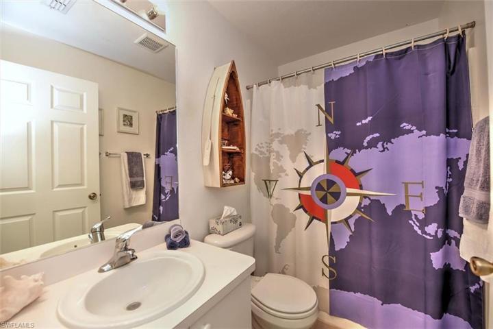 Guest bath with a shower tub combo.