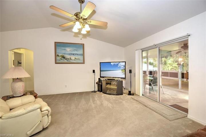 This view is looking from the kitchen bar giving you an excellent view of the lanai.