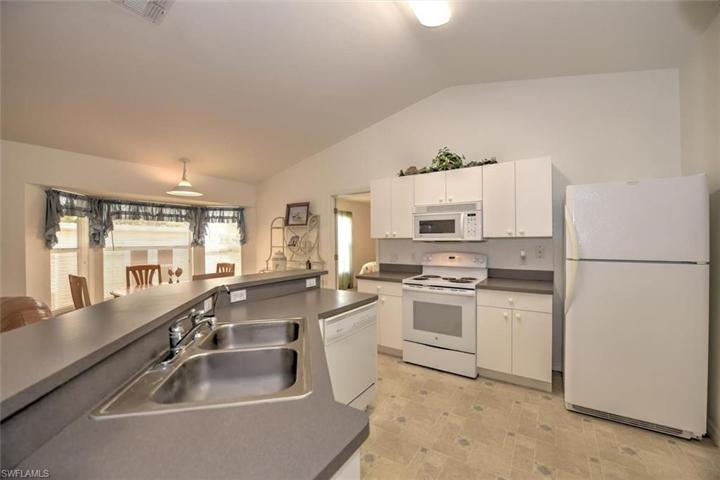 This is a very functional kitchen layout with a pantry on the right outside the picture.