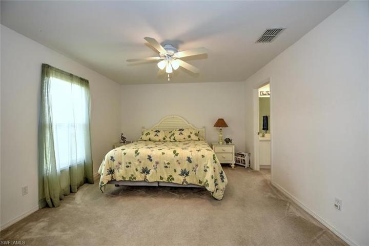 The master is spacious and features a walk in closet.