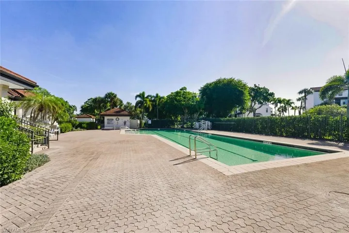 Community pool featuring a patio area