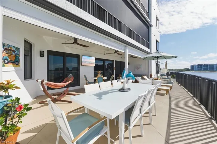 View of patio / terrace with a ceiling fan and outdoor dining area