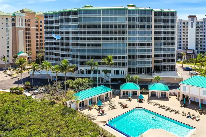 Community pool featuring a gazebo and a patio