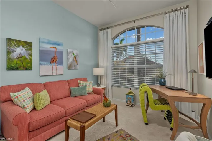 Living room with light colored carpet