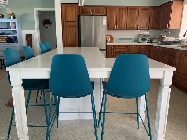 New Island, cabinets, stainless appliances