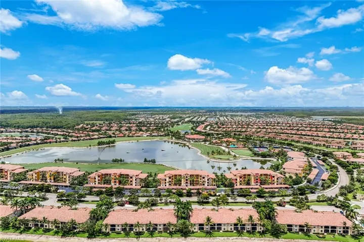 Aerial View of Large Lake and Golf Course behind the Condo Building