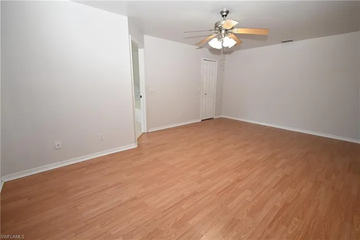 Unfurnished room featuring light wood-style floors and a ceiling fan