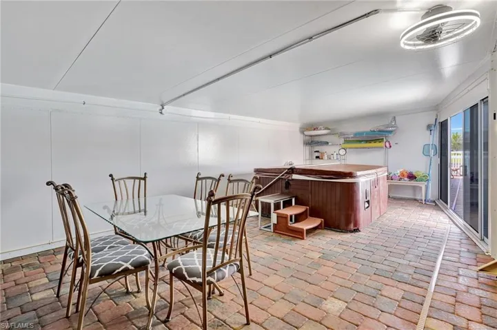 Dining room featuring brick floor