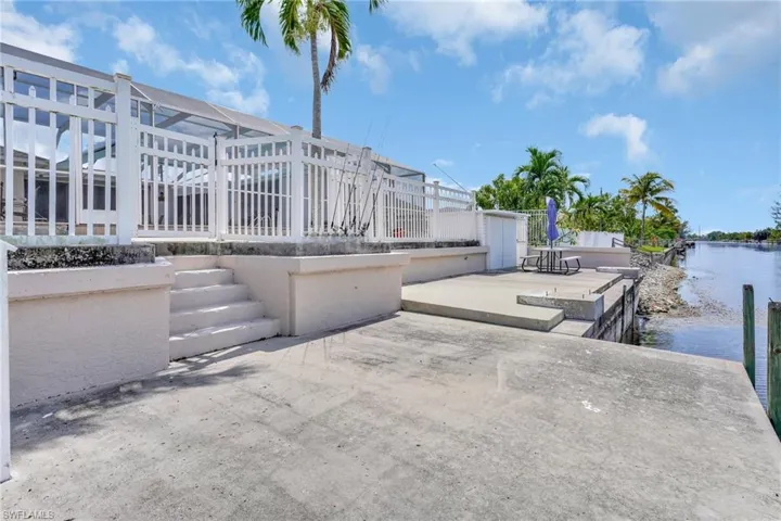 View of patio / terrace featuring a water view