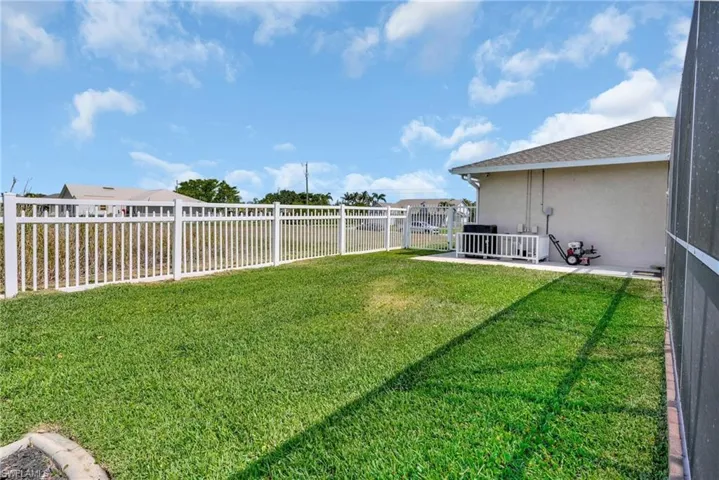 View of yard with a patio area and a fenced backyard