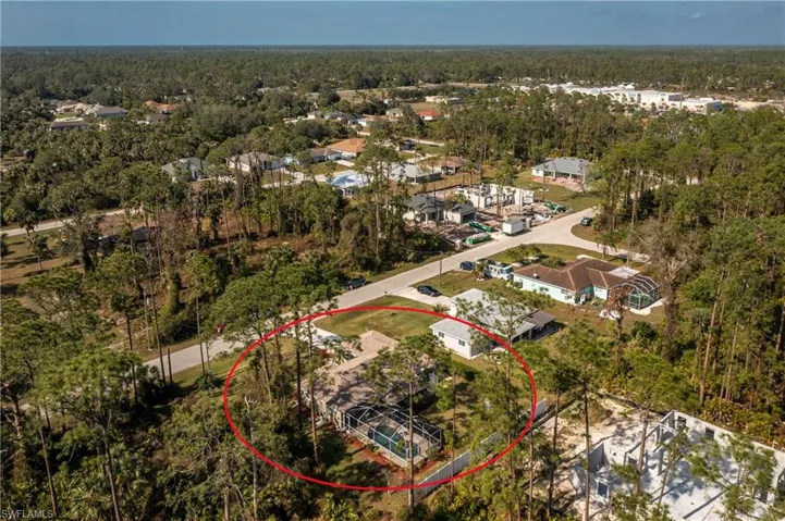 Bird's eye view featuring a view of trees