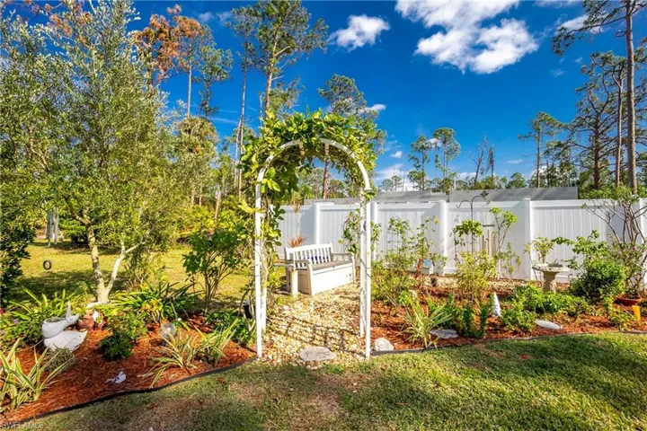 View of yard featuring fence