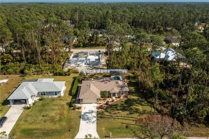 Drone / aerial view featuring a view of trees