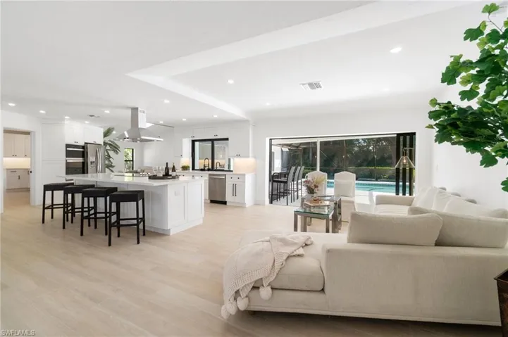 Living area with recessed lighting, and plenty of natural light