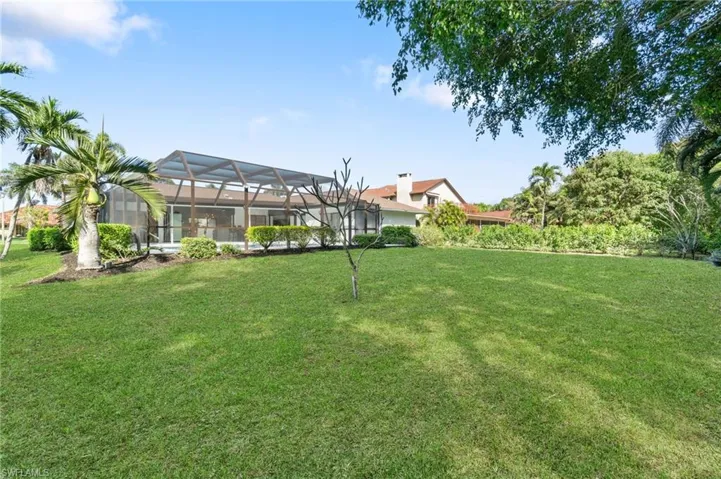 View of yard featuring a lanai