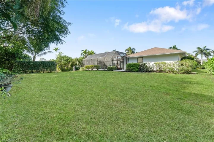 View of yard featuring a lanai