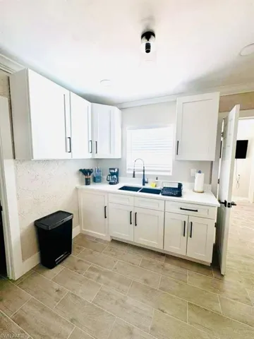 Kitchen with white cabinets