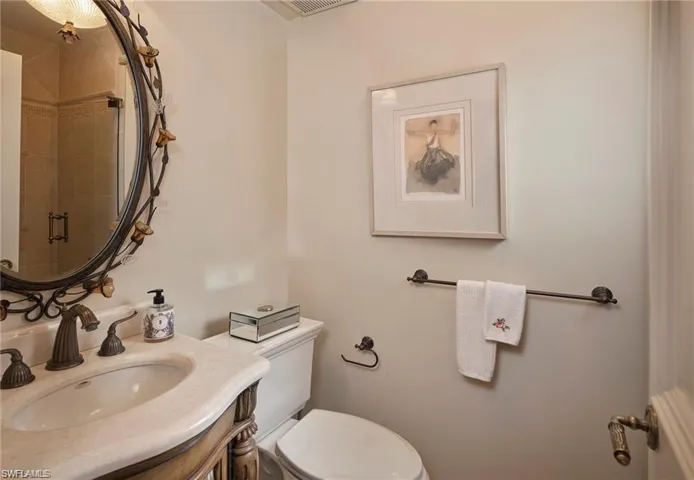 Bathroom with vanity and toilet