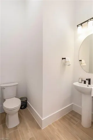 Bathroom featuring wood tiled floors