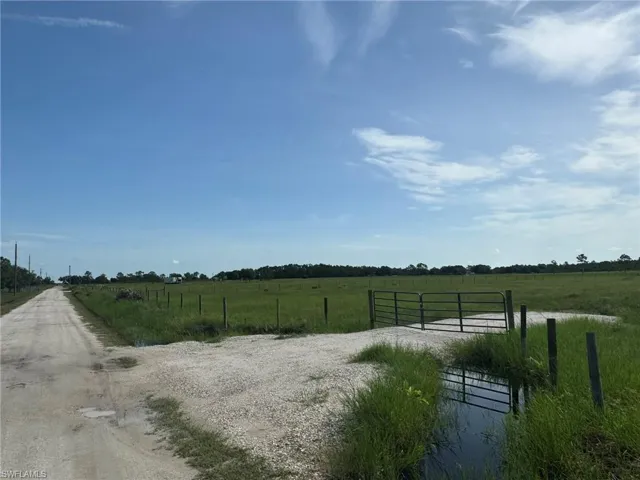 GATE & DRIVE INTO PARCEL OVER DRAINAGE