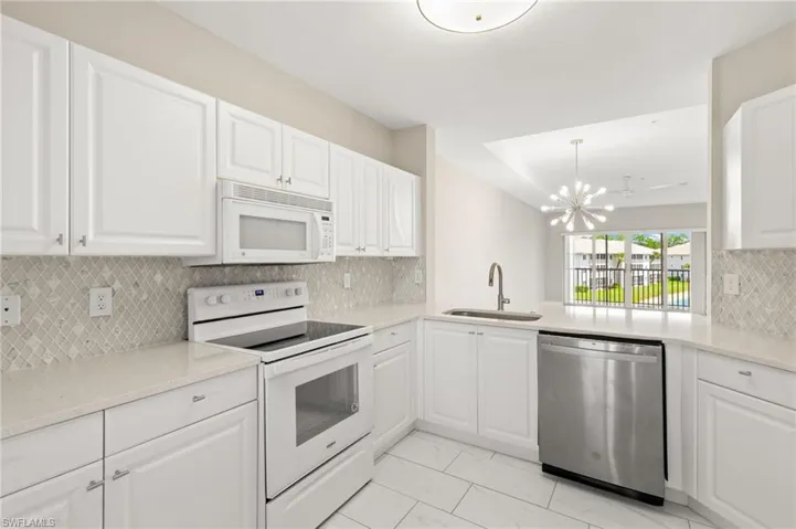 Tons of natural light floods the home and the open concept layout is perfect for entertaining!