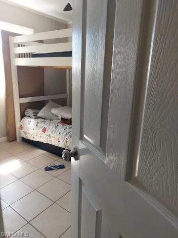 View of tiled bedroom