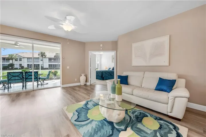 Living area with light wood-style LVP flooring