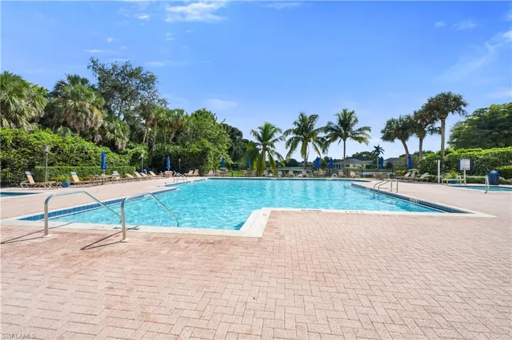 Community Pool / Spa featuring Brick Paver Patio
