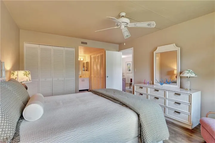 Main Bedroom with ceiling fan, and vinyl wood look flooring