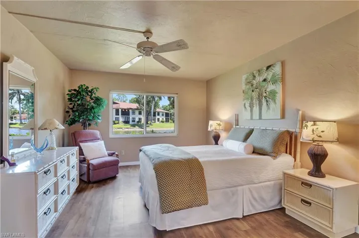 Main Bedroom with ceiling fan, and vinyl wood look flooring