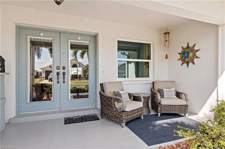 Property entrance with french doors