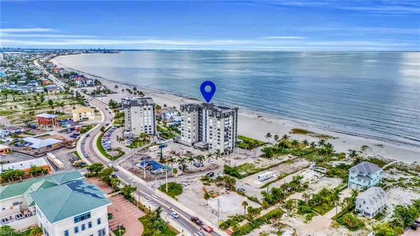 Bird's eye view with a view of the beach and a water view