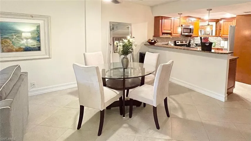 Dining room featuring light tile patterned floors