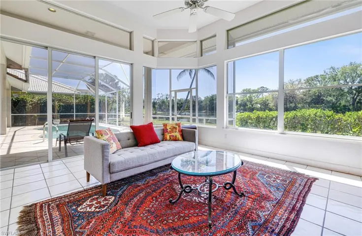 Sunroom with tile patterned floors
