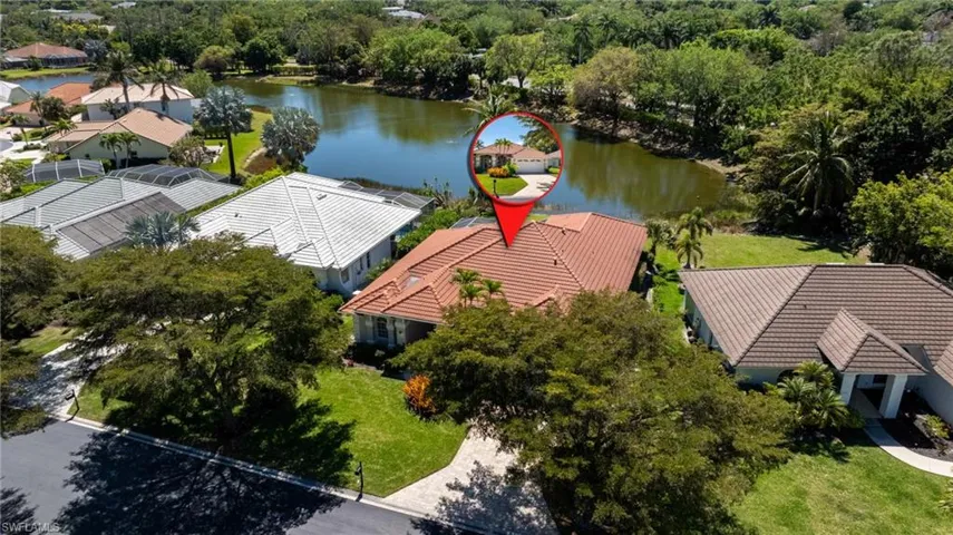 Drone / aerial view featuring a residential view and a water view