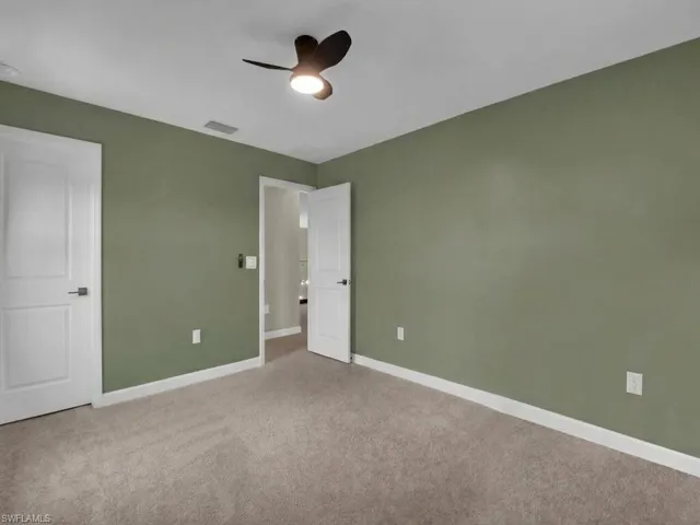 Corner bedroom with large walk in closet